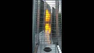 Lighting a torch pyramid patio heater from Marin Event Lighting Mill Valley California
